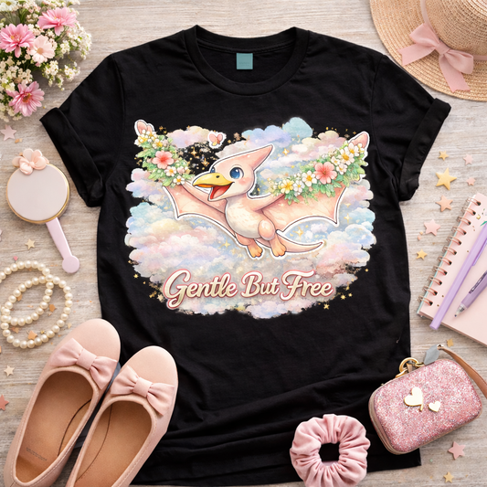 Cute pterodactyl shirt with flowers and gentle but free quote on black tee soft girl aesthetic dinosaur shirt flatlay