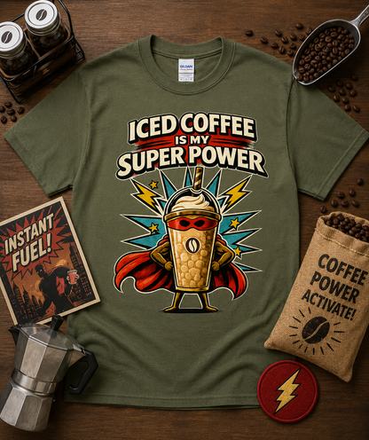 Iced Coffee Is My Super Power comic superhero coffee graphic tee on Military Green Gildan 5000 Classic Heavy Cotton featuring a caped iced coffee cup perfect gift for coffee lovers outdoor café fans comic lovers and baristas throughout the United States