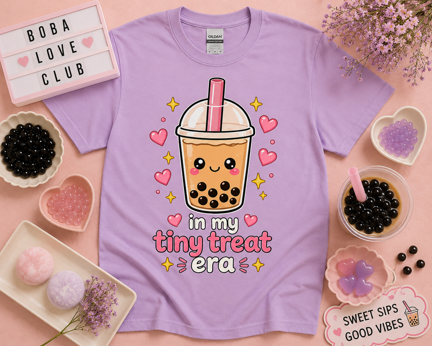 Cute kawaii bubble tea shirt in orchid purple featuring in my tiny treat era design with pink hearts and pastel boba aesthetic flat lay styled for soft girl fashion and cozy café lovers by New Chapter Tees USA