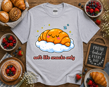 Sport gray Gildan 5000 bakery themed croissant graphic tee with soft life snacks only design and cozy bakery flat lay styling featuring pastries berries and aesthetic bakery decor for women and teen girls in California