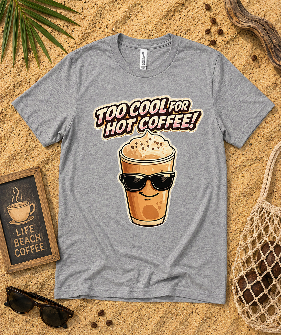 Athletic Heather Bella Canvas 3001 Too Cool For Hot Coffee premium soft iced coffee shirt flat lay with beach coffee themed props fun summer apparel USA
