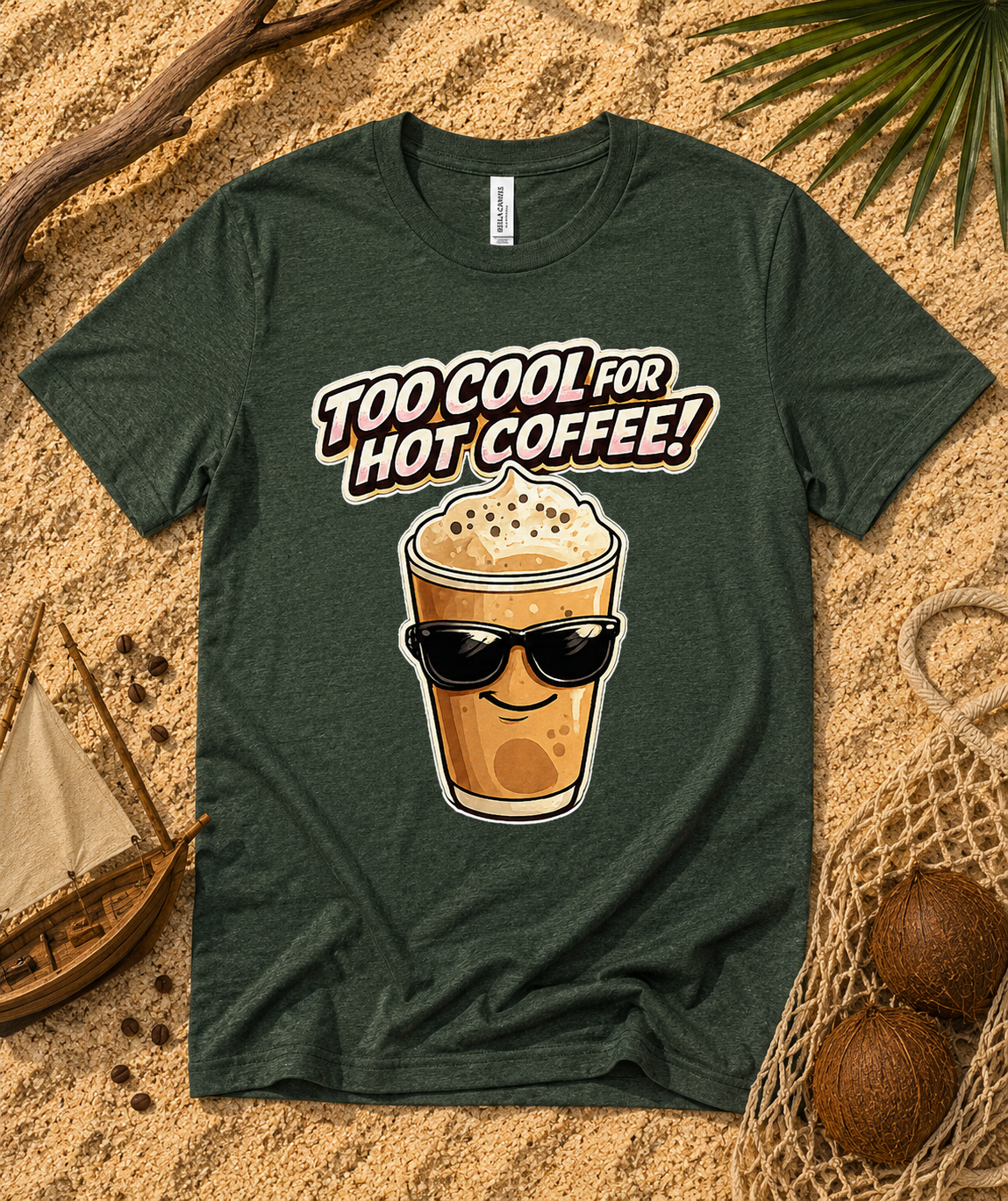 Heather Forest Bella Canvas 3001 Too Cool For Hot Coffee premium soft coffee lover shirt flat lay with sandy beach props fun iced coffee graphic tee USA