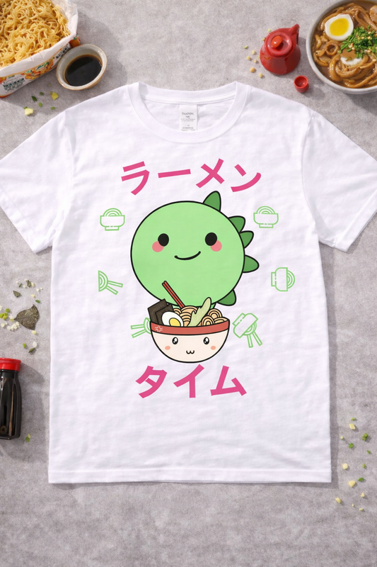 White kawaii dinosaur ramen graphic t shirt with cute anime design and Japanese text flatlay, foodie ramen shirt with Asian food props