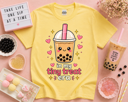Cute yellow bubble tea graphic tee with kawaii tiny treat era design and playful boba shop aesthetic flat lay for fun pastel fashion lovers and cozy snack inspired clothing in California USA